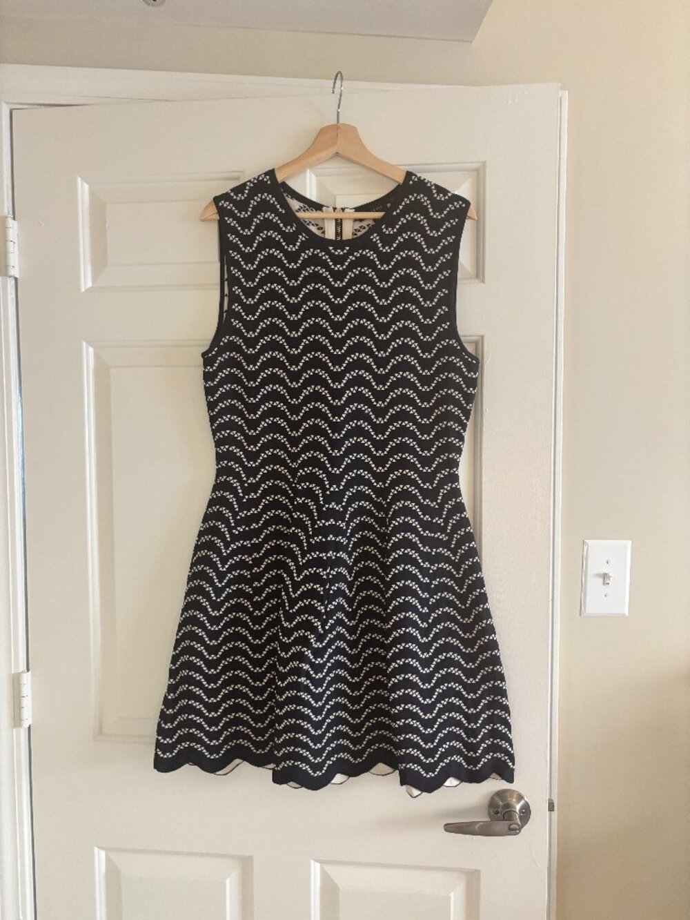 Ted Baker London black and white dress w/ scalloped hem in wavy geometric patter